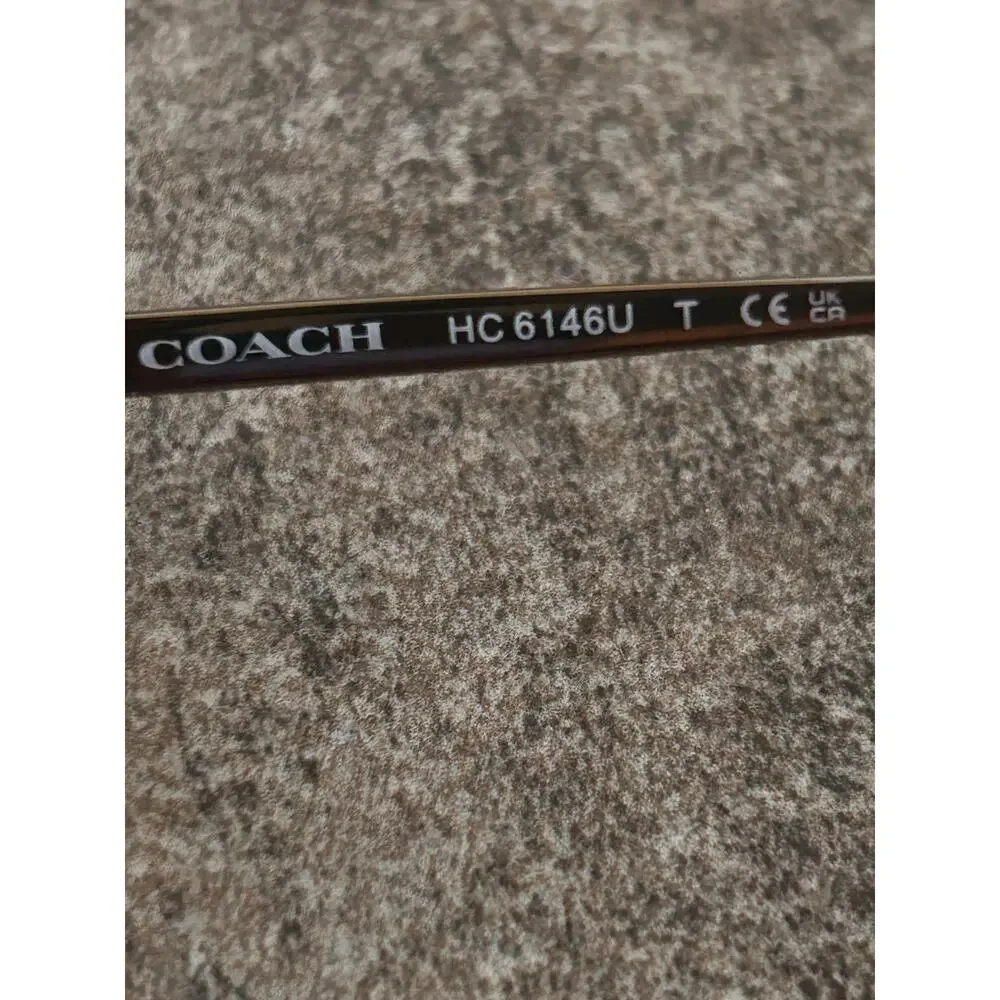 Coach HC6146U Eyeglass Frames and case Transparent brown butterfly silhouette